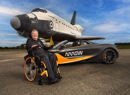 Sam Schmidt likes to go fast even with his physical limitations. For the first few years of the SAM project, a Chevy Corvette was the car of choice. On this day, at the Shuttle Landing Facility in Florida Sam tested out a new McClaren which put a smile on his face. How fast did he go....213 mph.